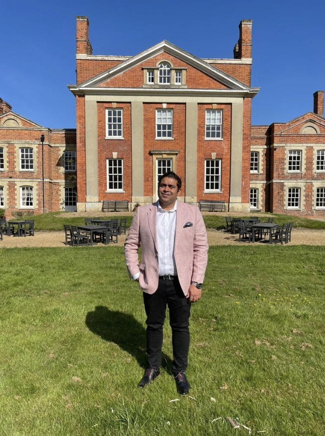 Sidd Mahajan in front of Warbrook House Heritage Hotel